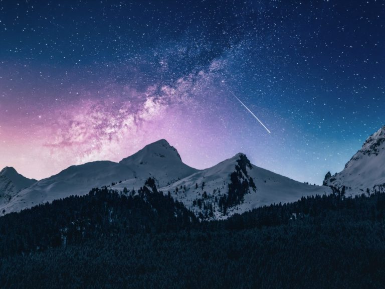 snow mountain under stars