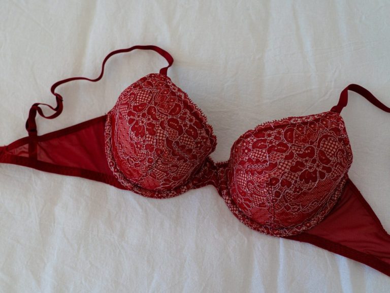Red Brassiere on White Textile