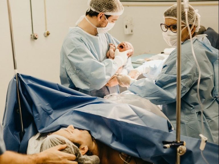 Woman Lying Inside Delivery Room