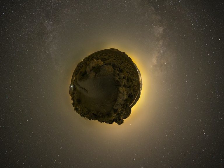 floating rock on galaxy illustration