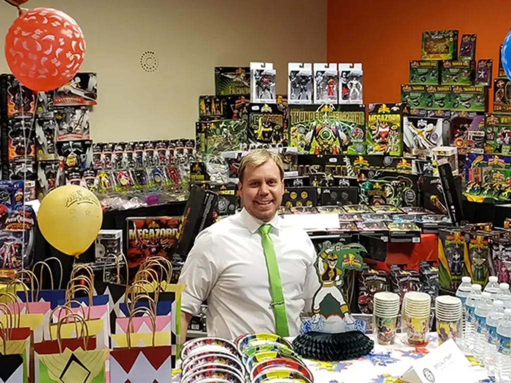 Michael Nilsen smiling among his collection tcm e