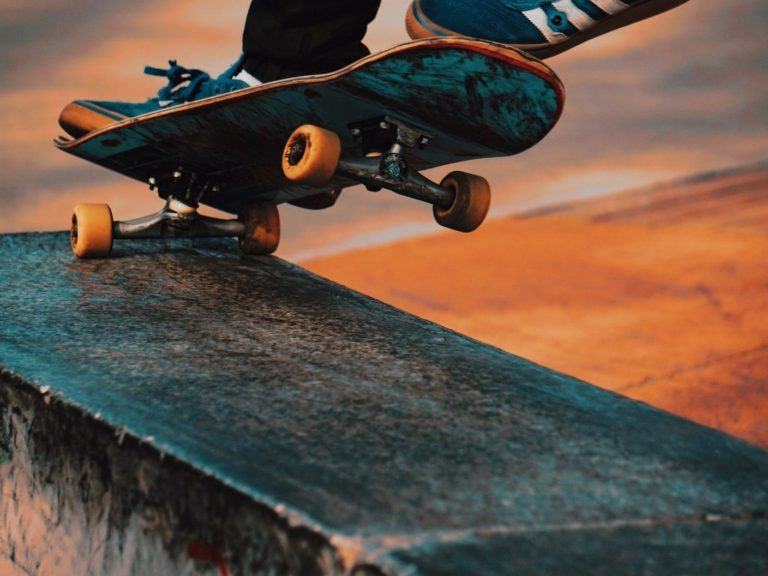 person doing kick flip trick