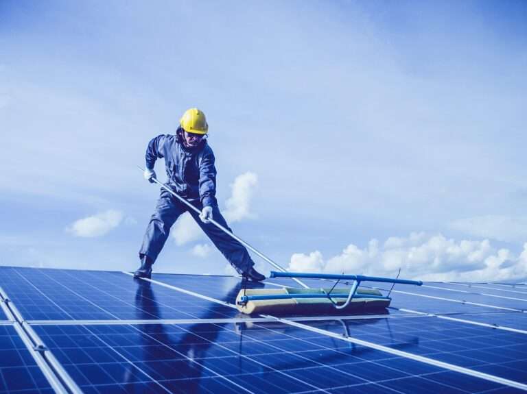 man, solar panel, rooftop