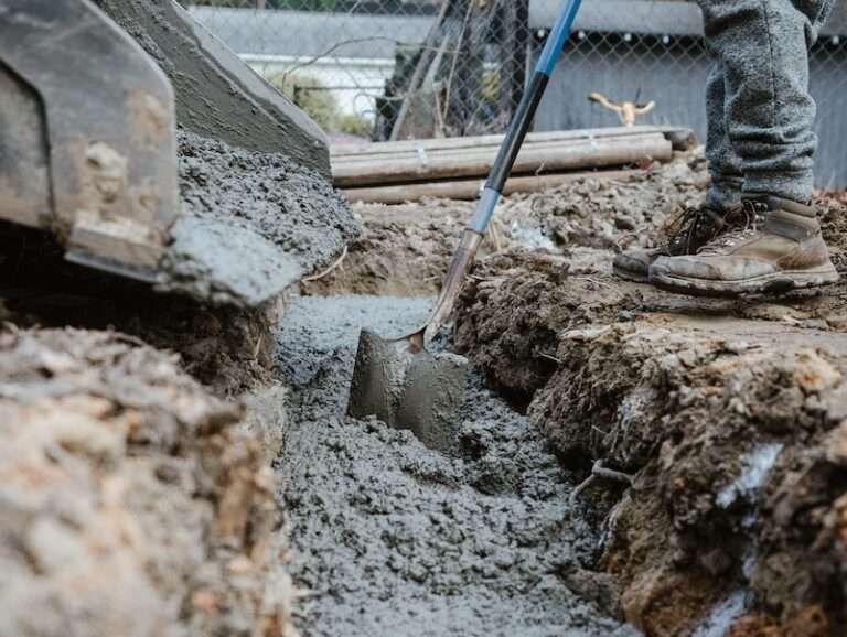 a person digging in the dirt