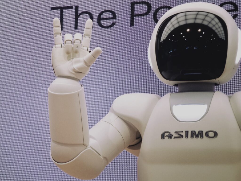 Asimo robot doing handsign