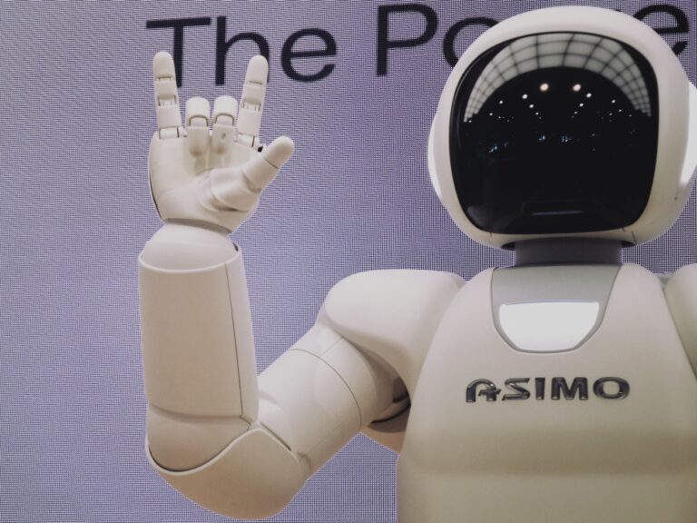 Asimo robot doing handsign