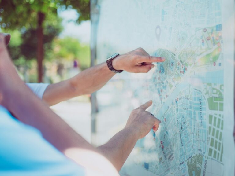person pointing map