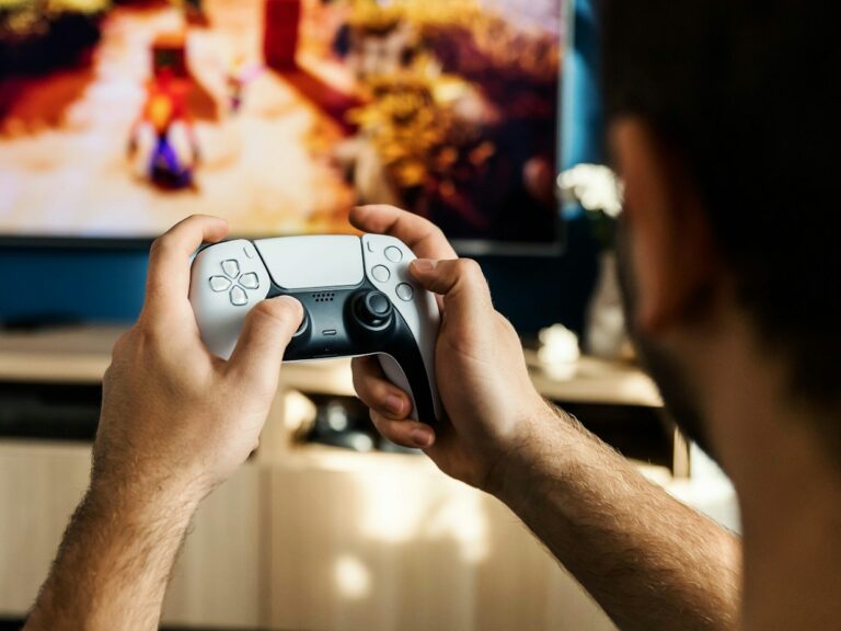 a man playing a video game on the nintendo wii